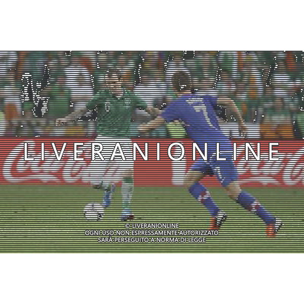 10.06.2012 POZNAN - STADION MIEJSKI ARENA EURO 2012 ( POZNAN POLAND CITY STADIUM) PILKA NOZNA (FOOTBALL ) MISTRZOSTWA EUROPY W PILCE NOZNEJ UEFA EURO 2012 ( EUROPEAN CHAMPIONSHIPS UEFA EURO 2012 ) GRUPA C ( POOL C ) MECZ IRLANDIA - CHORWACJA ( GAME IRELAND - CROATIA) NZ GLENN WHELAN ( L0 IVAN RAKITIC 9 P) FOTO KTARZYNA PLEWCZYNSKA/CYFRASPORT/NEWSPIX.PL --- Newspix.pl irlanda croazia -AG ALDO LIVERANI SAS - ITALY ONLY - *** Local Caption *** .