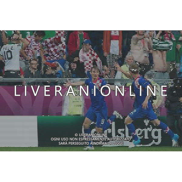 10.06.2012. POZNAN POLSKA, STADION MIEJSKI (MUNICIPAL STADUIM). (UEFA EURO 2012 POLAND UKRAINE) MISTRZOSTWA EUROPY W PILCE NOZNEJ. MECZ IRLANDIA - CHORWACJA GRUPA C (GAME MATCH THE REPUBLIC OF IRELAND - CROATIA POOL C). NZ/ BRAMKA GOL RADOSC GOAL NIKICA JELAVIC, IVAN STRINIC FOT. JAKUB KACZMARCZYK / PRESSFOCUS NEWSPIXPL --- Newspix.pl irlanda croazia -AG ALDO LIVERANI SAS - ITALY ONLY - *** Local Caption *** .