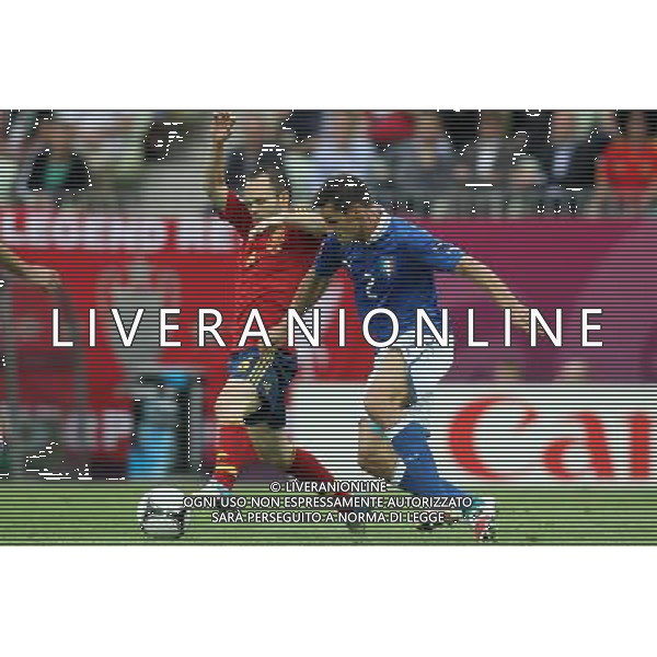 10.06.2012 GDANSK - ARENA GDANSK ( GDANSK POLAND ARENA GDANSK STADIUM STADIUM) PILKA NOZNA (FOOTBALL ) MISTRZOSTWA EUROPY W PILCE NOZNEJ UEFA EURO 2012 ( EUROPEAN CHAPIONSHIPS UEFA EURO 2012 ) GRUPA C ( POOL C) MECZ HISZPANIA - WLOCHY ( GAME SPAIN - ITALY ) NZ ANDRÃ‰S INIESTA (L) CHRISTIAN MAGGIO (P) FOTO MATEUSZ TRZUSKOWSKI/CYFRASPORT/NEWSPIX.PL --- Newspix.pl -AG ALDO LIVERANI SAS - ITALY ONLY - *** Local Caption *** .