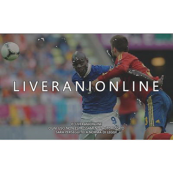 Campionati Europei UEFA 2012 Polonia/Ucraina Gruppo C Danzica (Polonia) - 10.06.2012 Spagna-Italia Nella Foto:Balotelli Mario - PiqÃ¨ Gerard /Ph.Vitez-Ag. Aldo Liverani