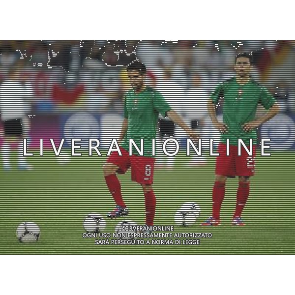 LWOW STADION OLIMPIJSKI 09.06.2012 EURO 2012 PILKA NOZNA GRUPA B NIEMCY - PORTUGALIA NZ JOAO MOUTINHO POR HELDER POSTIGA POR FOT MICHAL NOWAK / NEWSPIX.PL LVIV OLYMPIC STADIUM 09.06.2012 EURO 2012 GROUP B GERMANY - PORTUGAL JOAO MOUTINHO POR HELDER POSTIGA POR MICHAL NOWAK / NEWSPIX.PL --- Newspix.pl /AG ALDO LIVERANI SAS - ITALY ONLY *** Local Caption *** .