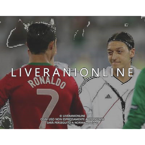 LWOW STADION OLIMPIJSKI 09.06.2012 EURO 2012 PILKA NOZNA GRUPA B NIEMCY - PORTUGALIA NZ CRISTIANO RONALDO POR MESUT OEZIL GER FOT MICHAL NOWAK / NEWSPIX.PL LVIV OLYMPIC STADIUM 09.06.2012 EURO 2012 GROUP B GERMANY - PORTUGAL CRISTIANO RONALDO POR MESUT OEZIL GER MICHAL NOWAK / NEWSPIX.PL --- Newspix.pl /AG ALDO LIVERANI SAS - ITALY ONLY *** Local Caption *** .