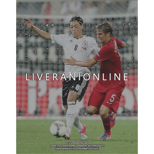 LWOW STADION OLIMPIJSKI 09.06.2012 EURO 2012 PILKA NOZNA GRUPA B NIEMCY - PORTUGALIA NZ MESUT OEZIL GER FABIO COENTRAO POR FOT MICHAL NOWAK / NEWSPIX.PL LVIV OLYMPIC STADIUM 09.06.2012 EURO 2012 GROUP B GERMANY - PORTUGAL MESUT OEZIL GER FABIO COENTRAO POR MICHAL NOWAK / NEWSPIX.PL --- Newspix.pl /AG ALDO LIVERANI SAS - ITALY ONLY *** Local Caption *** .