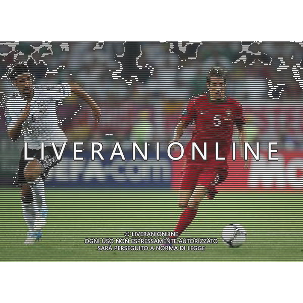 LWOW STADION OLIMPIJSKI 09.06.2012 EURO 2012 PILKA NOZNA GRUPA B NIEMCY - PORTUGALIA NZ SAMI KHEDIRA GER FABIO COENTRAO POR FOT MICHAL NOWAK / NEWSPIX.PL LVIV OLYMPIC STADIUM 09.06.2012 EURO 2012 GROUP B GERMANY - PORTUGAL SAMI KHEDIRA GER FABIO COENTRAO POR MICHAL NOWAK / NEWSPIX.PL --- Newspix.pl /AG ALDO LIVERANI SAS - ITALY ONLY *** Local Caption *** .
