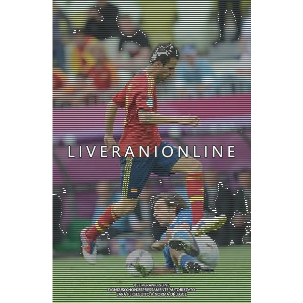 (120611) -- GDANSK, June 11, 2012 () -- Cesc Fabregas (Up) of Spain vies with Andrea Pirlo of Italy during their Group C match at the Euro 2012 football championships in Gdansk, Poland, June 10, 2012. The match ended in a 1-1 draw. (/Liu Lihang) (jyc) AG ALDO LIVERANI S A S ONLY ITALY