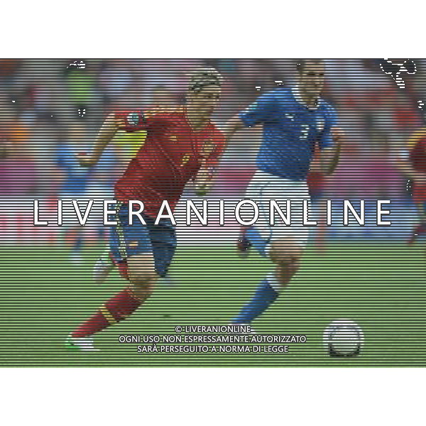 (120611) -- GDANSK, June 11, 2012 () -- Fernando Torres (L) of Spain runs with the ball during the Group C match against Italy at the Euro 2012 football championships in Gdansk, Poland, June 10, 2012. The match ended in a 1-1 draw. (/Liu Lihang) (jyc) AG ALDO LIVERANI S A S ONLY ITALY
