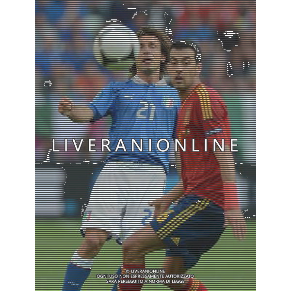 (120611) -- GDANSK, June 11, 2012 () -- Andrea Pirlo (L) of Italy vies with Sergio Busquets of Spain during their Group C match at the Euro 2012 football championships in Gdansk, Poland, June 10, 2012. (/Liu Lihang) (jyc) AG ALDO LIVERANI S A S ONLY ITALY