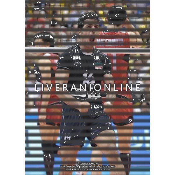 (120610) -- TOKYO, June 10, 2012 () -- Iran\'s Alireza Mobasheri Demneh (C) celebrates after scoring during the men\'s volleyball qualifying tournament match against Japan for the London 2012 Olympics in Tokyo, Japan, on June 10, 2012. Iran won 3-0. (/Kenichiro Seki) AG ALDO LIVERANI S A S ONLY ITALY