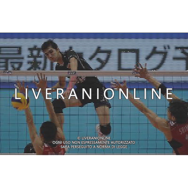 (120610) -- TOKYO, June 10, 2012 () -- Iran\'s Farhad Ghaemi (C) spikes the ball during the men\'s volleyball qualifying tournament match against Japan for the London 2012 Olympics in Tokyo, Japan, on June 10, 2012. Iran won 3-0. (/Li Ying) AG ALDO LIVERANI S A S ONLY ITALY