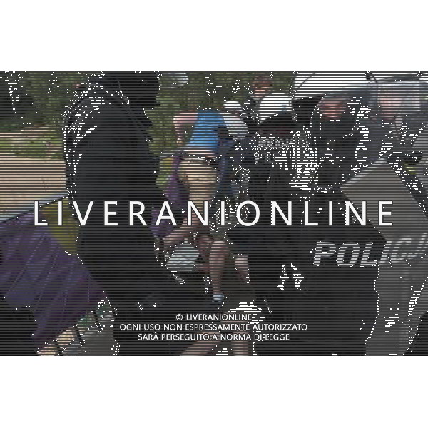 12.06.2012 WARSZAWA. PRZEMARSZ KIBICOW ROSYJSKICH NA STADION NARODOWY. FOTO. DAMIAN BURZYKOWSKI/NEWSPIX.PL POLISH HOOLIGANS CLASHED WITH POLICE DURING THE MARCH OF RUSSIAN SUPPORTERS BEFORE POLAND - RUSSIA GAME --- Newspix.pl /AGENZIA ALDO LIVERANI SAS - ITALY ONLY - Scontri tra la polizia e i tifosi prima dell\'incontro tra Polonia - Russia Campionati Europei UEFA 2012 Polonia/Ucraina Gruppo A Varsavia (Polonia) *** Local Caption *** www.newspix.pl mail us: info@newspix.pl call us: 0048 022 23 22 222 --- Polish Picture Agency by Ringier Axel Springer Poland