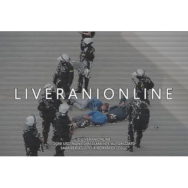 12.06.2012 WARSZAWA. PRZEMARSZ KIBICOW ROSYJSKICH NA STADION NARODOWY. FOTO. DAMIAN BURZYKOWSKI/NEWSPIX.PL POLISH HOOLIGANS CLASHED WITH POLICE DURING THE MARCH OF RUSSIAN SUPPORTERS BEFORE POLAND - RUSSIA GAME --- Newspix.pl /AGENZIA ALDO LIVERANI SAS - ITALY ONLY - Scontri tra la polizia e i tifosi prima dell\'incontro tra Polonia - Russia Campionati Europei UEFA 2012 Polonia/Ucraina Gruppo A Varsavia (Polonia) *** Local Caption *** www.newspix.pl mail us: info@newspix.pl call us: 0048 022 23 22 222 --- Polish Picture Agency by Ringier Axel Springer Poland