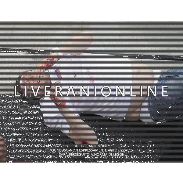 Warszawa 12/06/2012 Przemarsz z zadymy Rosjan przed meczem Polska Rosja na stadionie Narodowym Fot: Ciecier POLISH HOOLIGANS CLASHED WITH POLICE DURING THE MARCH OF RUSSIAN SUPPORTERS BEFORE POLAND - RUSSIA GAME --- Newspix.pl /AGENZIA ALDO LIVERANI SAS - ITALY ONLY - Scontri tra la polizia e i tifosi prima dell\'incontro tra Polonia - Russia Campionati Europei UEFA 2012 Polonia/Ucraina Gruppo A Varsavia (Polonia) *** Local Caption *** www.newspix.pl mail us: info@newspix.pl call us: 0048 022 23 22 222 --- Polish Picture Agency by Ringier Axel Springer Poland