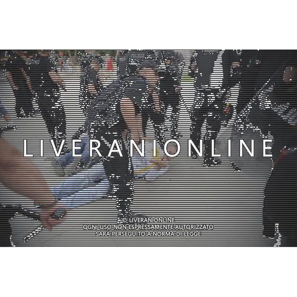 Warszawa 12/06/2012 Przemarsz z zadymy Rosjan przed meczem Polska Rosja na stadionie Narodowym Fot: Ciecier POLISH HOOLIGANS CLASHED WITH POLICE DURING THE MARCH OF RUSSIAN SUPPORTERS BEFORE POLAND - RUSSIA GAME --- Newspix.pl /AGENZIA ALDO LIVERANI SAS - ITALY ONLY - Scontri tra la polizia e i tifosi prima dell\'incontro tra Polonia - Russia Campionati Europei UEFA 2012 Polonia/Ucraina Gruppo A Varsavia (Polonia) *** Local Caption *** www.newspix.pl mail us: info@newspix.pl call us: 0048 022 23 22 222 --- Polish Picture Agency by Ringier Axel Springer Poland