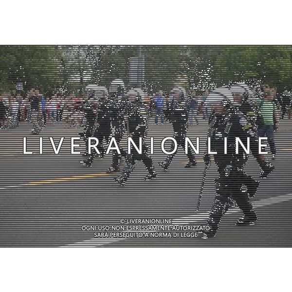 Warszawa 12/06/2012 Przemarsz z zadymy Rosjan przed meczem Polska Rosja na stadionie Narodowym Fot: Ciecier POLISH HOOLIGANS CLASHED WITH POLICE DURING THE MARCH OF RUSSIAN SUPPORTERS BEFORE POLAND - RUSSIA GAME --- Newspix.pl /AGENZIA ALDO LIVERANI SAS - ITALY ONLY - Scontri tra la polizia e i tifosi prima dell\'incontro tra Polonia - Russia Campionati Europei UEFA 2012 Polonia/Ucraina Gruppo A Varsavia (Polonia) *** Local Caption *** www.newspix.pl mail us: info@newspix.pl call us: 0048 022 23 22 222 --- Polish Picture Agency by Ringier Axel Springer Poland