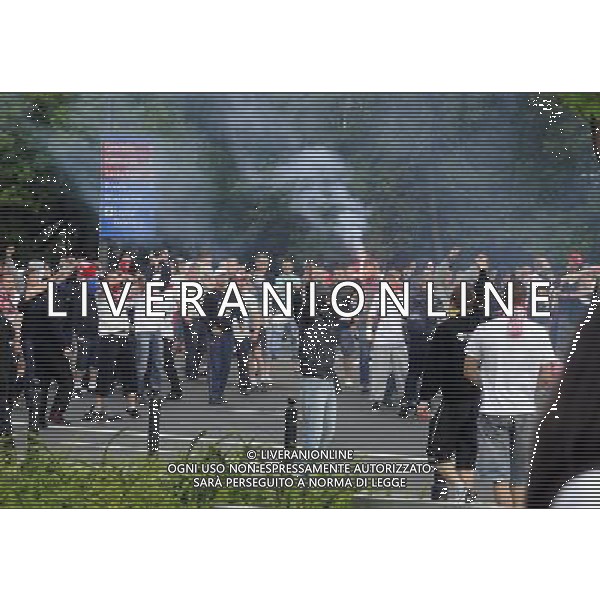 Warszawa 12/06/2012 Przemarsz z zadymy Rosjan przed meczem Polska Rosja na stadionie Narodowym Fot: Ciecier POLISH HOOLIGANS CLASHED WITH POLICE DURING THE MARCH OF RUSSIAN SUPPORTERS BEFORE POLAND - RUSSIA GAME --- Newspix.pl /AGENZIA ALDO LIVERANI SAS - ITALY ONLY - Scontri tra la polizia e i tifosi prima dell\'incontro tra Polonia - Russia Campionati Europei UEFA 2012 Polonia/Ucraina Gruppo A Varsavia (Polonia) *** Local Caption *** www.newspix.pl mail us: info@newspix.pl call us: 0048 022 23 22 222 --- Polish Picture Agency by Ringier Axel Springer Poland