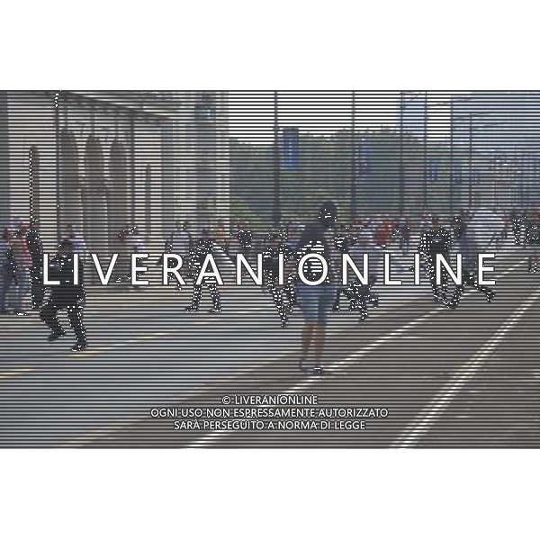 Warszawa 12/06/2012 Przemarsz z zadymy Rosjan przed meczem Polska Rosja na stadionie Narodowym Fot: Ciecier POLISH HOOLIGANS CLASHED WITH POLICE DURING THE MARCH OF RUSSIAN SUPPORTERS BEFORE POLAND - RUSSIA GAME --- Newspix.pl /AGENZIA ALDO LIVERANI SAS - ITALY ONLY - Scontri tra la polizia e i tifosi prima dell\'incontro tra Polonia - Russia Campionati Europei UEFA 2012 Polonia/Ucraina Gruppo A Varsavia (Polonia) *** Local Caption *** www.newspix.pl mail us: info@newspix.pl call us: 0048 022 23 22 222 --- Polish Picture Agency by Ringier Axel Springer Poland