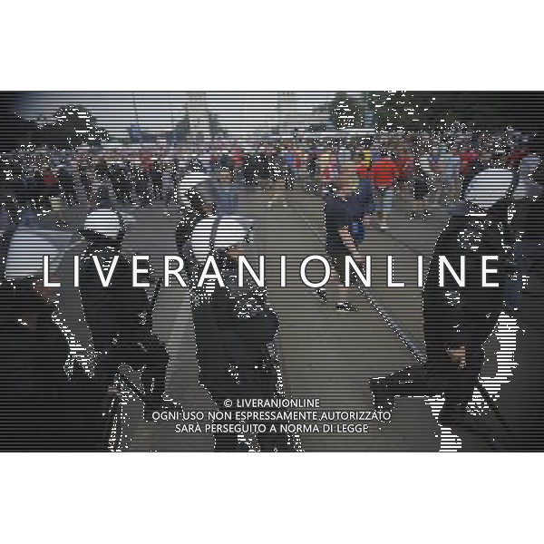 Warszawa 12/06/2012 Przemarsz z zadymy Rosjan przed meczem Polska Rosja na stadionie Narodowym Fot: Ciecier POLISH HOOLIGANS CLASHED WITH POLICE DURING THE MARCH OF RUSSIAN SUPPORTERS BEFORE POLAND - RUSSIA GAME --- Newspix.pl /AGENZIA ALDO LIVERANI SAS - ITALY ONLY - Scontri tra la polizia e i tifosi prima dell\'incontro tra Polonia - Russia Campionati Europei UEFA 2012 Polonia/Ucraina Gruppo A Varsavia (Polonia) *** Local Caption *** www.newspix.pl mail us: info@newspix.pl call us: 0048 022 23 22 222 --- Polish Picture Agency by Ringier Axel Springer Poland