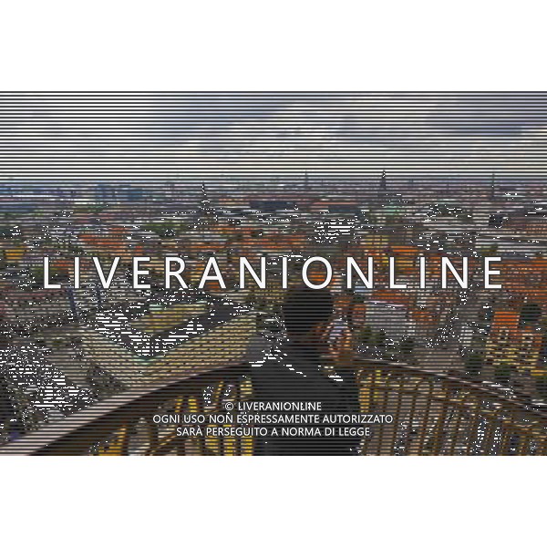 (120614) -- COPENHAGEN, June 14, 2012 () -- A tourist stands on the stairs of a church in Copenhagen, capital of Denmark, June 11, 2012. (/Zhou Lei) AG ALDO LIVERANI S A S ONLY ITALY