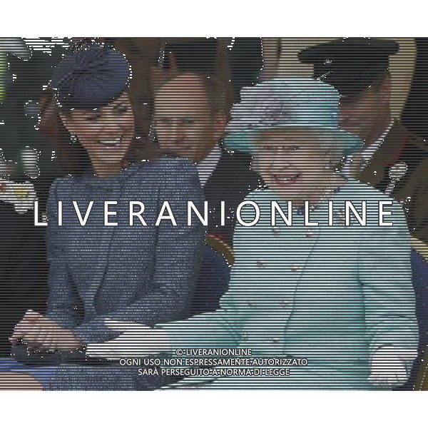 Britain\'s Catherine, Duchess of Cambridge (L) laughs as Queen Elizabeth gestures while they watch part of a children\'s sports event during a visit to Vernon Park in Nottingham, central England, June 13, 2012. /PHOTOSHOT/AG ALDO LIVERANI SAS - ITALY ONLY - *** Local Caption *** .