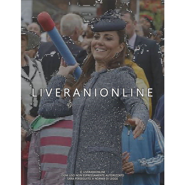 Britain\'s Catherine, Duchess of Cambridge throws a foam javelin at a children\'s sports event, during her visit to Vernon Park in Nottingham, central England June 13, 2012. /PHOTOSHOT/AG ALDO LIVERANI SAS - ITALY ONLY - *** Local Caption *** .