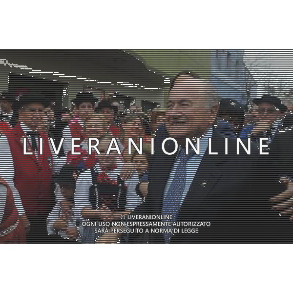 (120615) -- MONTEVIDEO, June 15, 2012 () -- FIFA President Joseph Blatter (R) greets supporters during his visit to Colonia Suiza, 130 kilometers from Montevideo, Uruguay, on June 14, 2012. (/Nicolas Celaya) (py) AG ALDO LIVERANI S A S ONLY ITALY