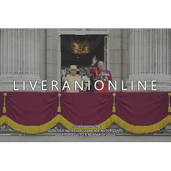 HRH Queen Elisabeth the 2nd \' Prince Philip, The Duke of Edinburgh waves to the crowds from the balcony of Buckingham Palace Since 1748 Trooping the Colour has also marked the official birthday of the British sovereign. It is held in London annually on a Saturday in June on Horse Guards Parade next to St. James\'s Park, and coincides with the publication of the Birthday Honours List. Among the audience are the Royal Family, invited guests, ticketholders and the general public. The colourful ceremony is also known as \'The Queen\'s Birthday Parade\', though the official birthday for the Queen is on the 21st of June ©photoshot/Agenzia Aldo Liverani Sas - ITALY ONLY - REALI INGLESI: La regina Elisabetta II e famiglia reale ha festeggiato il suo compleanno ufficiale, passando in rassegna le truppe e le Guardie dei suoi reggimenti nel centro di Londra, Gran Bretagna, 16 giugno 2012