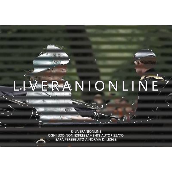 (120616) -- LONDON, June 16, 2012 () -- Britain\'s Camilla, Duchess of Cornwall (L) and Catherine, Duchess of Cambridge travel to Horse Guards Parade for the Trooping the Color ceremony in central London, Britain, June 16, 2012. Britain\'s Queen Elizabeth II celebrated her official birthday on Saturday, by reviewing troops from her Guards regiments and viewing a flypast of Royal Air Force planes in central London. The annual event known as the Trooping of the Color is always held on a Saturday in the middle of June to mark the Queen\'s official birthday. (/Bimal Gautam) ©photoshot/Agenzia Aldo Liverani Sas - ITALY ONLY - REALI INGLESI: La regina Elisabetta II e famiglia reale ha festeggiato il suo compleanno ufficiale, passando in rassegna le truppe e le Guardie dei suoi reggimenti nel centro di Londra, Gran Bretagna, 16 giugno 2012