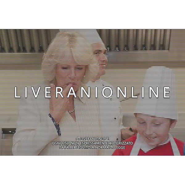 The Duchess of Cornwall licks icing from her finger as she meets Cory Hogg, a pupil at Eastington Primary School, Gloucestershire, in the kitchens at Buckingham Palace, in central London. Photo. Queen Elizabeth II and the Duchess of Cornwall met winners of the \'Cook for the Queen\' competition, who created the menu served at a reception at Buckingham Palace. Picture date: Friday June 15, 2012. ©photoshot/Agenzia Aldo Liverani Sas - ITALY ONLY - REALI INGLESI: La Regina Elisabetta II e Camilla duchessa di Cornovaglia hanno incontrato i vincitori del Concorso \'un Cuoco per la Regina\' che ha creato il menu servito ad un ricevimento a Buckingham Palace a Londra 15 giugno 2012. 