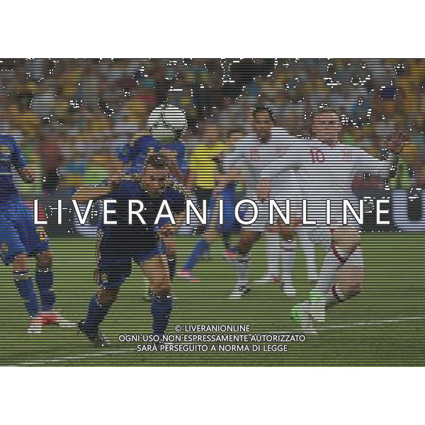 (120620) -- DONETSK, June 20, 2012 () -- Andriy Shevchenko (front L) of Ukraine heads the ball during the Group D 3rd round match at the Euro 2012 football championships in Donetsk, Ukraine, June 19, 2012.Ukraine lost 0-1.(/Meng Yongmin) (kh) ©PHOTOSHOT/ALDO LIVERANI SAS - ITALY ONLY -