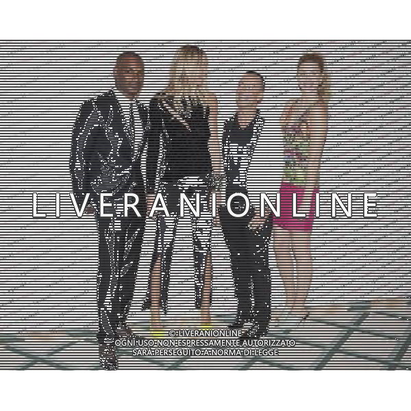 (L-R) Tyson Beckford, Elle Macpherson, Julien Macdonald \' Whitney Port pose for photographers during a photocall at Claridges Hotel ©photoshot/AG ALDO LIVERANI SAS - ITALY ONLY -