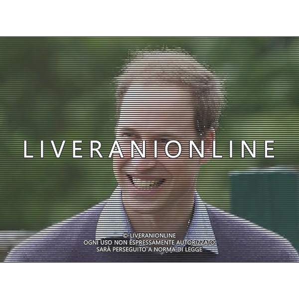 LYMPNE, ENGLAND - JUNE 06: Prince William, Duke of Cambridge smiles as he visits Port Lympne Wild Animal Park on June 6, 2012 in Port Lympne, England. Prince William, Duke of Cambridge was visiting the park to meet staff and rhinos involved in a translocation project. The Aspinall Foundation along with the Tusk Trust and the George Adamson Trust are combining forces to stage a rare translocation of three captive born black rhino to Mkomazi National Park in Tanzania in order to rejuvenate numbers of the black rhino in the area. The three animals are being airlifted in a dedicated DHL Boeing 757 from Manston Airport in Kent direct to Kilimanjaro Int Airport in Tanzania. The three black rhino have been donated by Damian Aspinall, Chairman of The Aspinall Foundation, from their breeding group at Port Lympne Wild Animal Park in Kent. The reintroduction of endangered species to the wild to assist breeding programmes is a major focus of The Aspinall Foundation. Prince William, Duke of Cambridge as Patron of Tusk Trust and a dedicated campaigner against poaching visited the rhinos at Port Lympne ahead of their translocation and today released a speech via the BBC highlighting his dedication to the fight against the illegal trade of ivory. /PHOTOSHOT/ALDO LIVERANI