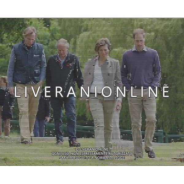 LYMPNE, ENGLAND - JUNE 06: (L-R) Damien Aspinall,Charlie Mayhew of Tusk Trust, Kate Silverton and Prince William, Duke of Cambridge visit Port Lympne Wild Animal Park on June 6, 2012 in Port Lympne, England. Prince William, Duke of Cambridge was visiting the park to meet staff and rhinos involved in a translocation project. The Aspinall Foundation along with the Tusk Trust and the George Adamson Trust are combining forces to stage a rare translocation of three captive born black rhino to Mkomazi National Park in Tanzania in order to rejuvenate numbers of the black rhino in the area. The three animals are being airlifted in a dedicated DHL Boeing 757 from Manston Airport in Kent direct to Kilimanjaro Int Airport in Tanzania. The three black rhino have been donated by Damian Aspinall, Chairman of The Aspinall Foundation, from their breeding group at Port Lympne Wild Animal Park in Kent. The reintroduction of endangered species to the wild to assist breeding programmes is a major focus of The Aspinall Foundation. Prince William, Duke of Cambridge as Patron of Tusk Trust and a dedicated campaigner against poaching visited the rhinos at Port Lympne ahead of their translocation and today released a speech via the BBC highlighting his dedication to the fight against the illegal trade of ivory. /PHOTOSHOT/ALDO LIVERANI