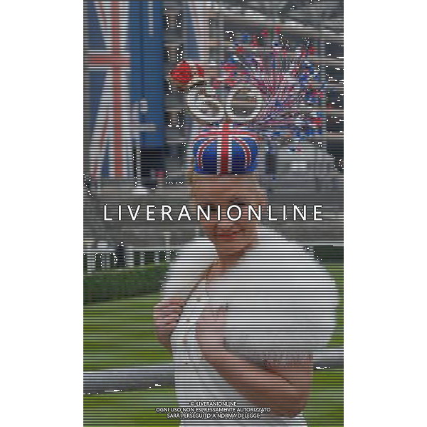 Ladies Day at Royal Ascot is traditionally seen as the height of English fashion, and even this yearÍs wet weather has not dampened the event. Ascot, Berkshire. England. 21-6-12 Royal jubilee diamond celebration hat, 60 years with union jack cross flag /PHOTOSHOT/ALDO LIVERANI SAS - ITALY ONLY
