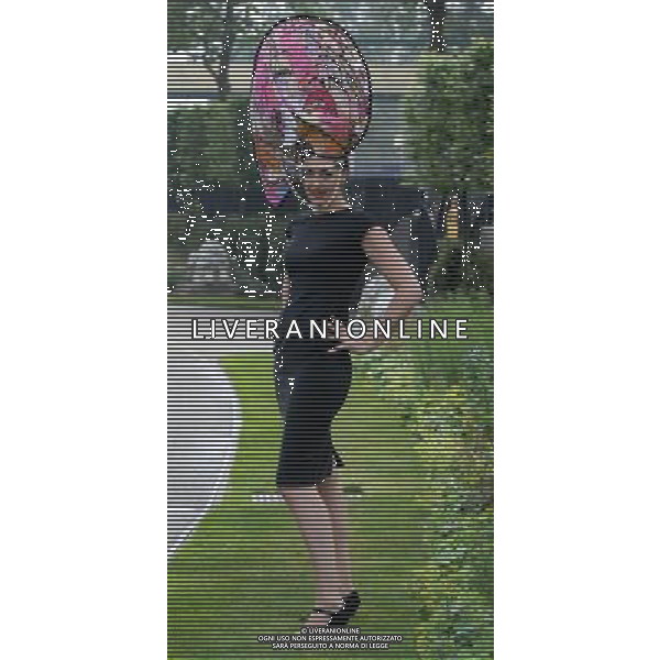 Ladies Day at Royal Ascot is traditionally seen as the height of English fashion, and even this yearÍs wet weather has not dampened the event. Ascot, Berkshire. England. 21-6-12 Pop Art Roy Lichtenstein Style Hat /PHOTOSHOT/ALDO LIVERANI SAS - ITALY ONLY