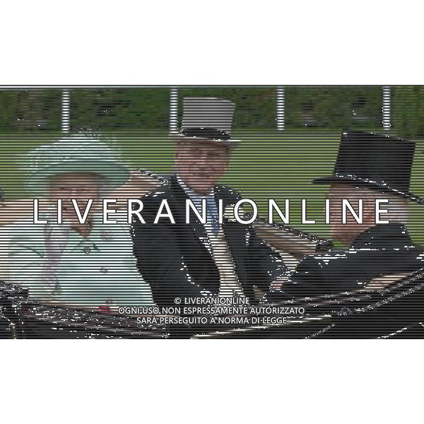 Ladies Day at Royal Ascot is traditionally seen as the height of English fashion, and even this yearÍs wet weather has not dampened the event. Ascot, Berkshire. England. The Queen arrives on Ladies Day with The Duke of Edinburgh. 21-6-12 /PHOTOSHOT/ALDO LIVERANI SAS - ITALY ONLY