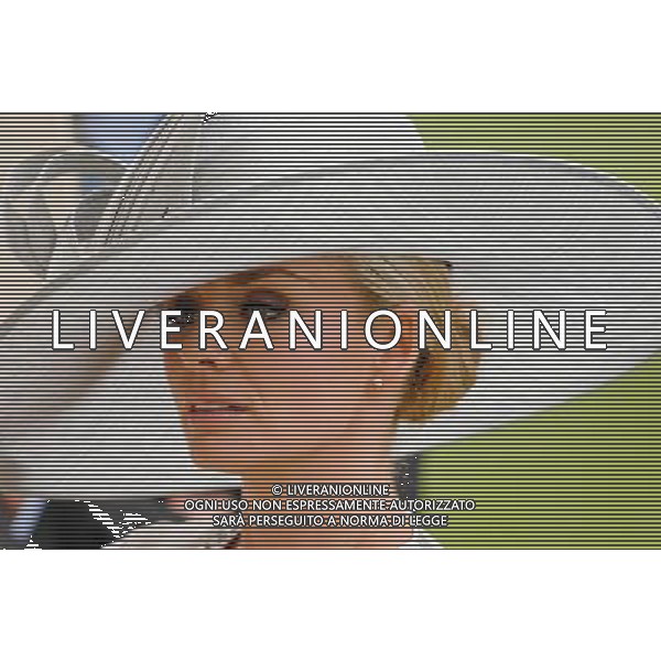 Ladies Day at Royal Ascot is traditionally seen as the height of English fashion, and even this yearÍs wet weather has not dampened the event. Ascot, Berkshire. England. Katherine Jenkins. 21-6-12 /PHOTOSHOT/ALDO LIVERANI SAS - ITALY ONLY