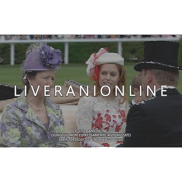 Ladies Day at Royal Ascot is traditionally seen as the height of English fashion, and even this yearÍs wet weather has not dampened the event. Ascot, Berkshire. England. The Princess Royal with Princess Eugenie. 21-6-12 /PHOTOSHOT/ALDO LIVERANI SAS - ITALY ONLY
