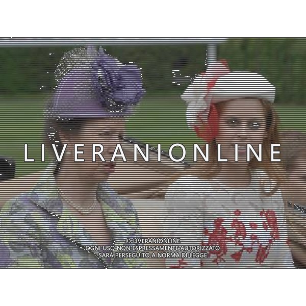 Ladies Day at Royal Ascot is traditionally seen as the height of English fashion, and even this yearÍs wet weather has not dampened the event. Ascot, Berkshire. England. The Princess Royal with Princess Eugenie. 21-6-12 /PHOTOSHOT/ALDO LIVERANI SAS - ITALY ONLY