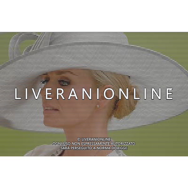 Ladies Day at Royal Ascot is traditionally seen as the height of English fashion, and even this yearÍs wet weather has not dampened the event. Ascot, Berkshire. England. Katherine Jenkins. 21-6-12 /PHOTOSHOT/ALDO LIVERANI SAS - ITALY ONLY