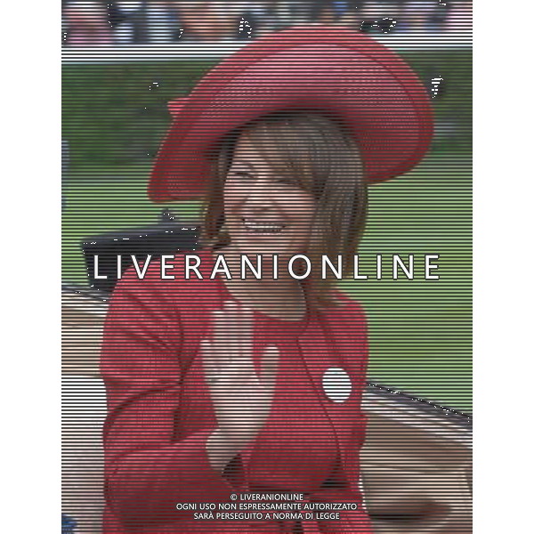 Ladies Day at Royal Ascot is traditionally seen as the height of English fashion, and even this yearÍs wet weather has not dampened the event. Ascot, Berkshire. England.Carol Middleton arrives on Ladies Day with her husband Michael. 21-6-12 /PHOTOSHOT/ALDO LIVERANI SAS - ITALY ONLY