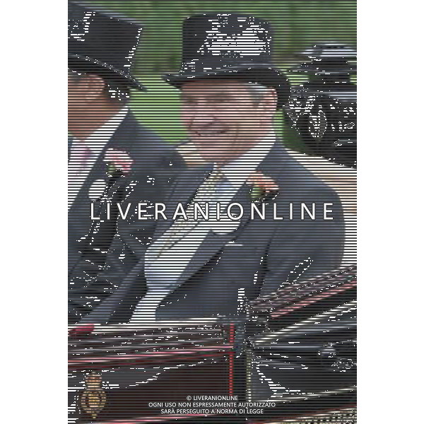 Ladies Day at Royal Ascot is traditionally seen as the height of English fashion, and even this yearÍs wet weather has not dampened the event. Ascot, Berkshire. England. Michael Middleton arrives on Ladies Day. 21-6-12 /PHOTOSHOT/ALDO LIVERANI SAS - ITALY ONLY