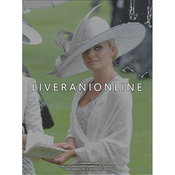 Ladies Day at Royal Ascot is traditionally seen as the height of English fashion, and even this yearÍs wet weather has not dampened the event. Ascot, Berkshire. England. Katherine Jenkins. 21-6-12 /PHOTOSHOT/ALDO LIVERANI SAS - ITALY ONLY