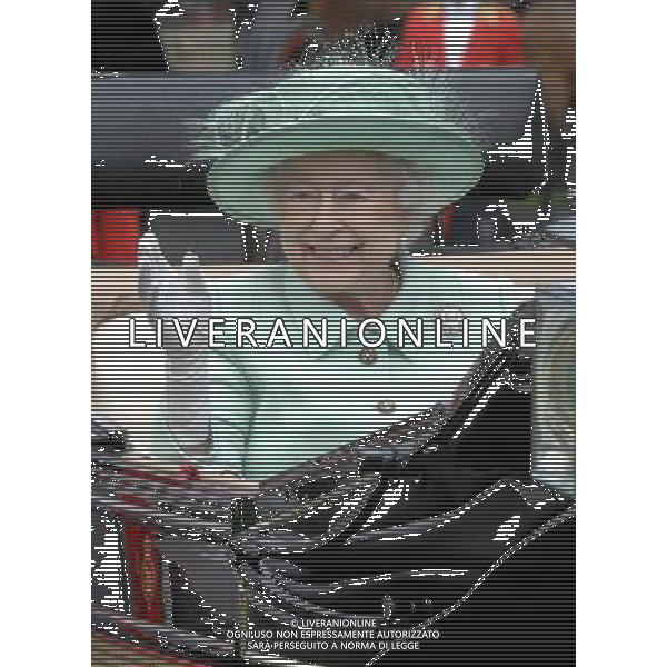 Ladies Day at Royal Ascot is traditionally seen as the height of English fashion, and even this yearÍs wet weather has not dampened the event. Ascot, Berkshire. England. The Queen arrives on Ladies Day with The Duke of Edinburgh. 21-6-12 /PHOTOSHOT/ALDO LIVERANI SAS - ITALY ONLY