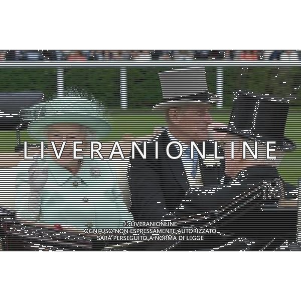 Ladies Day at Royal Ascot is traditionally seen as the height of English fashion, and even this yearÍs wet weather has not dampened the event. Ascot, Berkshire. England. The Queen arrives on Ladies Day with The Duke of Edinburgh. 21-6-12 /PHOTOSHOT/ALDO LIVERANI SAS - ITALY ONLY