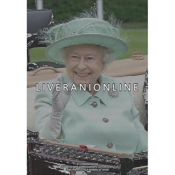 Ladies Day at Royal Ascot is traditionally seen as the height of English fashion, and even this yearÍs wet weather has not dampened the event. Ascot, Berkshire. England. The Queen arrives on Ladies Day with The Duke of Edinburgh. 21-6-12 /PHOTOSHOT/ALDO LIVERANI SAS - ITALY ONLY
