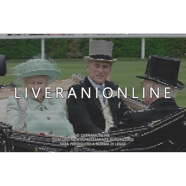 Ladies Day at Royal Ascot is traditionally seen as the height of English fashion, and even this yearÍs wet weather has not dampened the event. Ascot, Berkshire. England. The Queen arrives on Ladies Day with The Duke of Edinburgh. 21-6-12 /PHOTOSHOT/ALDO LIVERANI SAS - ITALY ONLY