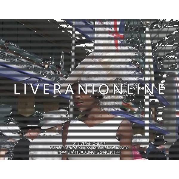 (120622) -- London, June 22, 2012 () -- A woman wearing hat is seen on the Royal Ascot, in Ascot, Berkshire, UK, June 21, 2012. Dated from 1711, the annual Royal Ascot week is one of Europe\'s most famous horse racing event. The Thursday in every Royal Ascot week is the traditional Ladies\' Day, on which spectating ladies specially wear beautiful hats for the Gold Cup race. (/Zhang Yuenan) (zy) /PHOTOSHOT/ALDO LIVERANI SAS - ITALY ONLY