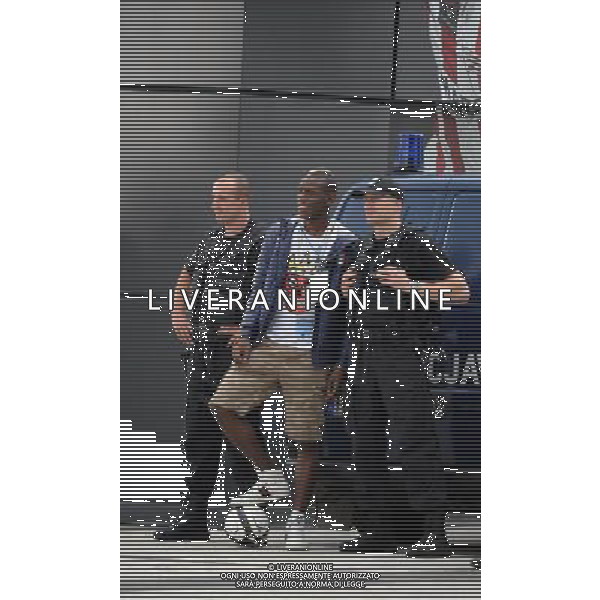 !!!UWAGA PAPARAZZI!!! BRAK ZGODY NA PUBLIKACJE. AUTOR NIE PONOSI ODPOWIEDZIALNOSCI ZA SKUTKI PRAWNE ZWIAZANE Z PUBLIKACJA. KRAKOW 26.06.2012 MLODSZY BRAT MARIO BALOTELLI ENOCH BALOTELII W CZASIE TRENINGU REPREZENTACJI WLOCHY PRZED STADIONIEM CRACOVIA KRAKOW KAPKOWAL Z OCHRONIARZEM. ZROBIL SOBIE TEZ PAMIATKOWE ZDJECIE Z POLICJA. NA SAM KONIEC UCIEKAL PRZED PAPARAZZI. N Z ENOCH BALOTELLI ROBI SOBIE PAMIATKOWE ZDJECIE Z POLICJANTAMI FOT. JAKUB GRUCA/ TOMASZ JAGODZINSKI/ NEWSPIX.PL --- Newspix.pl Little Brother Enoch BALOTELII Mario Balotelli during training REPRESENTATION FROM ITALY Cracovia Krakow stadium played ball with the bodyguard. DO a commemorative picture with the police. At the end I was running away from paparazzi. ENOCH BALOTELLI FRATELLO DI MARIO BALOTELLI GIOCA A CALCIO CON LA POLIZIA IN POLONIA NEL RITIRO DELL\'ITALIA PH.AG ALDO LIVERANI SAS - ITALY ONLY - *** Local Caption *** www.newspix.pl mail us: info@newspix.pl call us: 0048 022 23 22 222 --- Polish Picture Agency by Ringier Axel Springer Poland