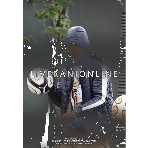 !!!UWAGA PAPARAZZI!!! BRAK ZGODY NA PUBLIKACJE. AUTOR NIE PONOSI ODPOWIEDZIALNOSCI ZA SKUTKI PRAWNE ZWIAZANE Z PUBLIKACJA. KRAKOW 26.06.2012 MLODSZY BRAT MARIO BALOTELLI ENOCH BALOTELII W CZASIE TRENINGU REPREZENTACJI WLOCHY PRZED STADIONIEM CRACOVIA KRAKOW KAPKOWAL Z OCHRONIARZEM. ZROBIL SOBIE TEZ PAMIATKOWE ZDJECIE Z POLICJA. NA SAM KONIEC UCIEKAL PRZED PAPARAZZI. N Z ENOCH BALOTELLI FOT. JAKUB GRUCA/ TOMASZ JAGODZINSKI/ NEWSPIX.PL --- Newspix.pl Little Brother Enoch BALOTELII Mario Balotelli during training REPRESENTATION FROM ITALY Cracovia Krakow stadium played ball with the bodyguard. DO a commemorative picture with the police. At the end I was running away from paparazzi. ENOCH BALOTELLI FRATELLO DI MARIO BALOTELLI GIOCA A CALCIO CON LA POLIZIA IN POLONIA NEL RITIRO DELL\'ITALIA PH.AG ALDO LIVERANI SAS - ITALY ONLY - *** Local Caption *** www.newspix.pl mail us: info@newspix.pl call us: 0048 022 23 22 222 --- Polish Picture Agency by Ringier Axel Springer Poland