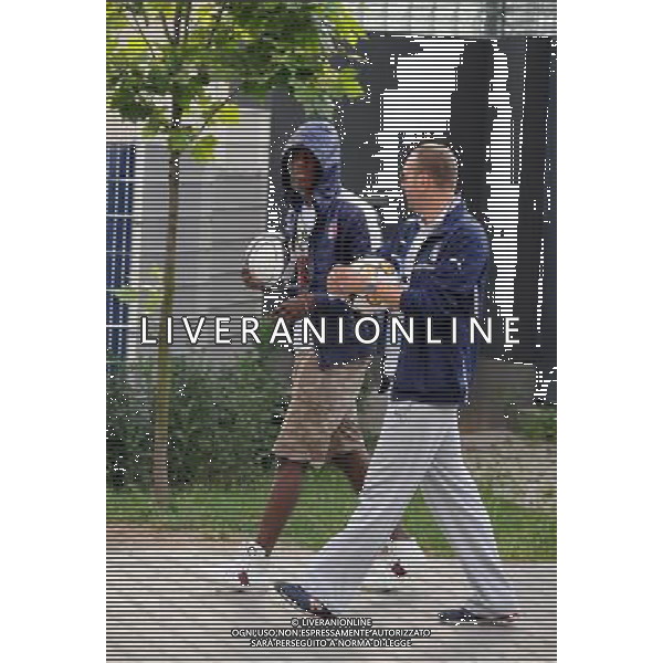 !!!UWAGA PAPARAZZI!!! BRAK ZGODY NA PUBLIKACJE. AUTOR NIE PONOSI ODPOWIEDZIALNOSCI ZA SKUTKI PRAWNE ZWIAZANE Z PUBLIKACJA. KRAKOW 26.06.2012 MLODSZY BRAT MARIO BALOTELLI ENOCH BALOTELII W CZASIE TRENINGU REPREZENTACJI WLOCHY PRZED STADIONIEM CRACOVIA KRAKOW KAPKOWAL Z OCHRONIARZEM. ZROBIL SOBIE TEZ PAMIATKOWE ZDJECIE Z POLICJA. NA SAM KONIEC UCIEKAL PRZED PAPARAZZI. N Z ENOCH BALOTELLI FOT. JAKUB GRUCA/ TOMASZ JAGODZINSKI/ NEWSPIX.PL --- Newspix.pl Little Brother Enoch BALOTELII Mario Balotelli during training REPRESENTATION FROM ITALY Cracovia Krakow stadium played ball with the bodyguard. DO a commemorative picture with the police. At the end I was running away from paparazzi. ENOCH BALOTELLI FRATELLO DI MARIO BALOTELLI GIOCA A CALCIO CON LA POLIZIA IN POLONIA NEL RITIRO DELL\'ITALIA PH.AG ALDO LIVERANI SAS - ITALY ONLY - *** Local Caption *** www.newspix.pl mail us: info@newspix.pl call us: 0048 022 23 22 222 --- Polish Picture Agency by Ringier Axel Springer Poland